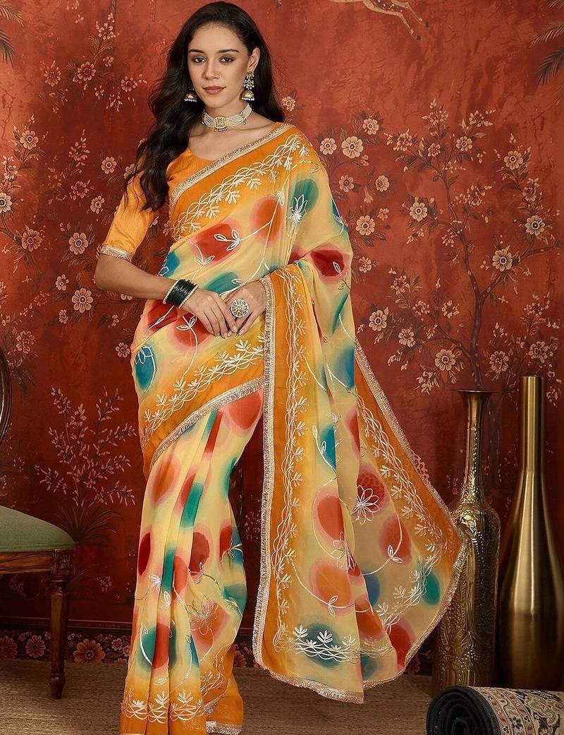 Yellow tie and dye zari  georgette saree