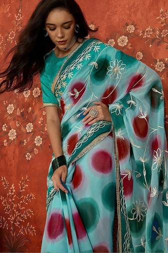Turquoise embroidered  georgette saree