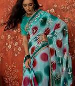 Turquoise embroidered  georgette saree