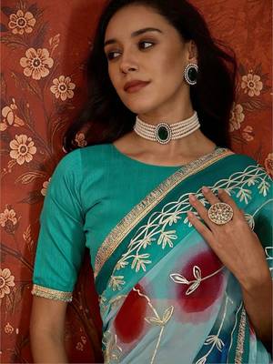 Turquoise embroidered  georgette saree 4