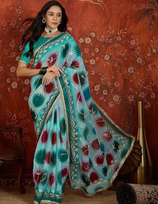 Turquoise embroidered  georgette saree 5