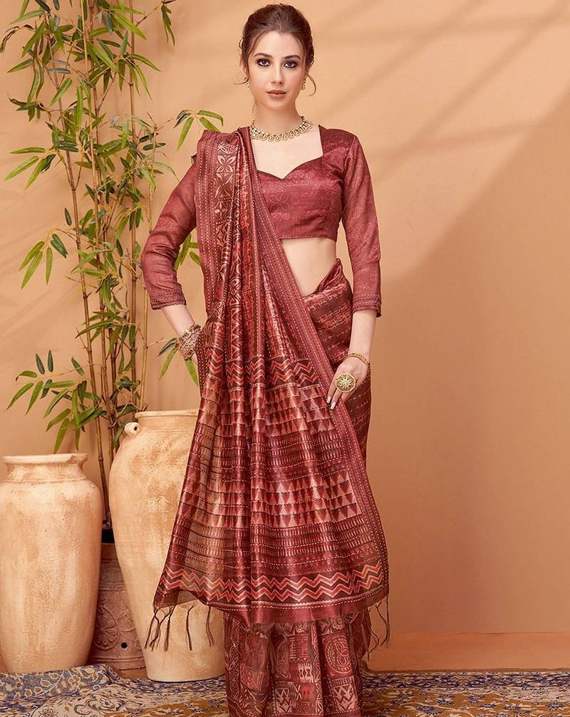 Maroon printed embroidered saree with matching blouse