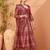 Maroon printed embroidered saree with matching blouse
