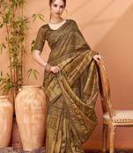 Brown women ethnic printed party wear saree with matching blouse