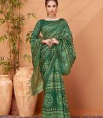 Green ethnic printed banarasi saree with matching blouse