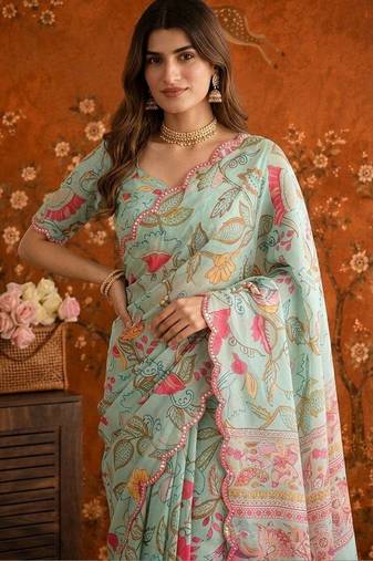 Sea green floral mirror work satin saree