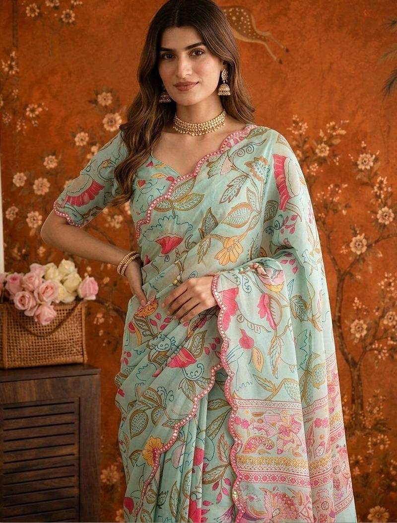 Sea green floral mirror work satin saree