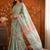 Sea green floral mirror work satin saree
