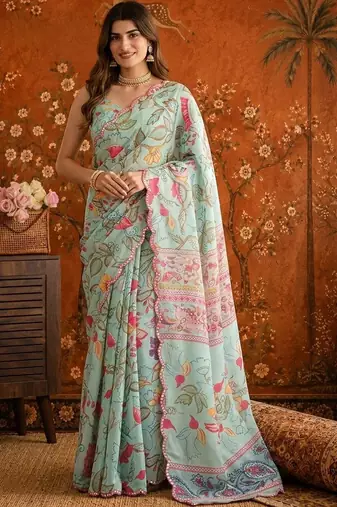 Sea green floral mirror work satin saree