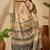 Beige floral printed  linen sarees with tassels & blouse piece