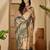 Beige floral printed  linen sarees with tassels & blouse piece