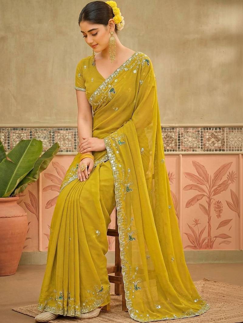 Yellow sequins embroidered sarees with unstitched blouse piece