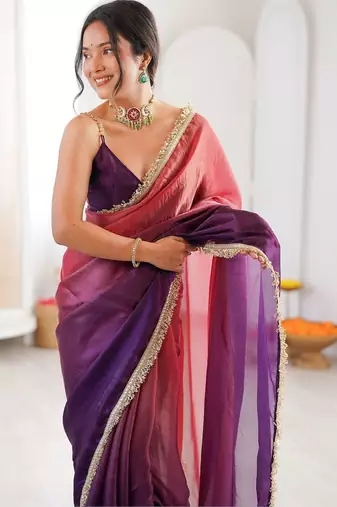 Purple sequinned tissue designer saree