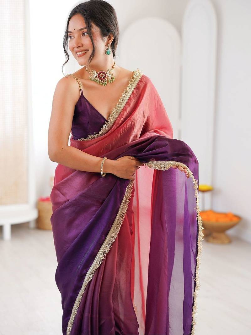 Purple sequinned tissue designer saree
