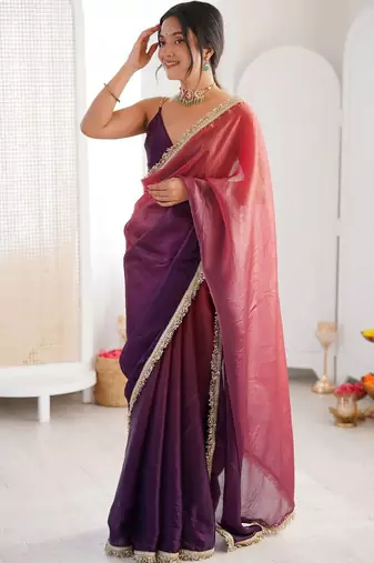 Purple sequinned tissue designer saree