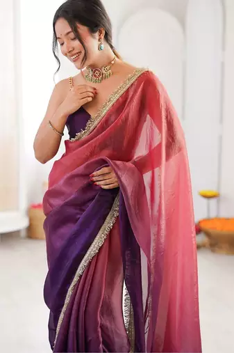 Purple sequinned tissue designer saree