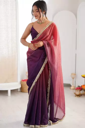 Purple sequinned tissue designer saree