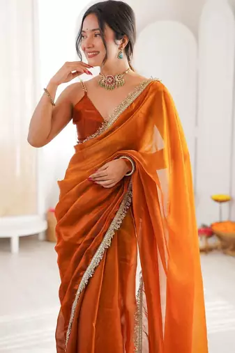 Orange sequinned tissue designer saree
