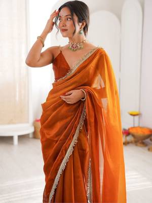 Orange sequinned tissue designer saree 5