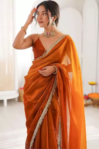 Orange sequinned tissue designer saree