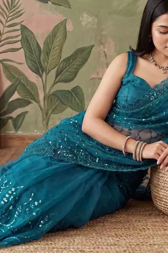 Teal embellished sequinned net designer saree