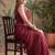 Maroon floral sequinned net designer saree