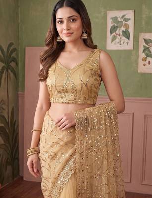 Gold floral sequinned net designer saree 5