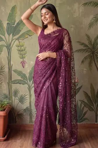 Purple floral sequinned net designer saree