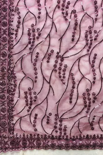 Purple floral sequinned net designer saree