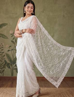 Off white floral sequinned net designer saree 1