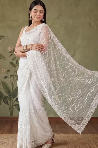 Off white floral sequinned net designer saree