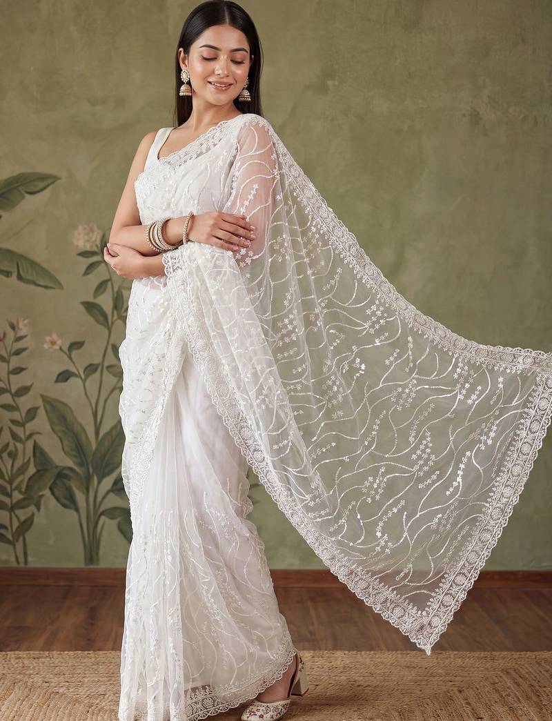 Off white floral sequinned net designer saree