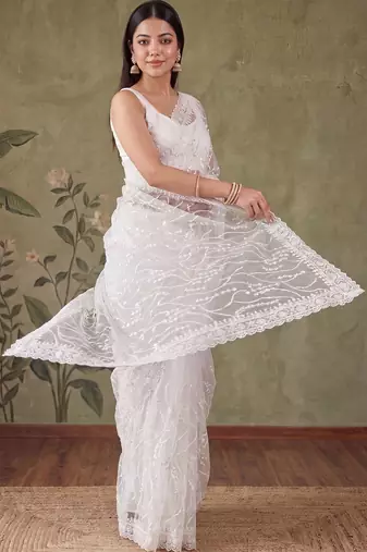 Off white floral sequinned net designer saree