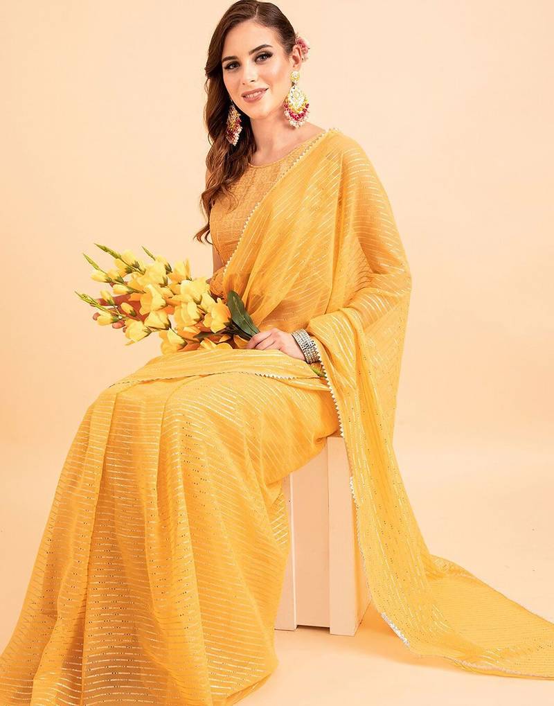 Yellow yellow poly chiffon embellished zari striped saree