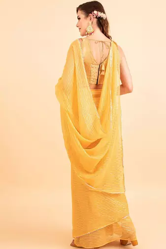 Yellow yellow poly chiffon embellished zari striped saree