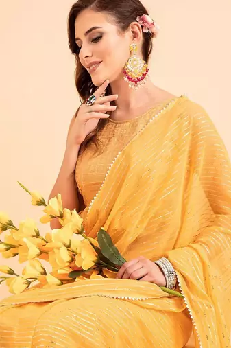 Yellow yellow poly chiffon embellished zari striped saree