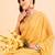 Yellow yellow poly chiffon embellished zari striped saree