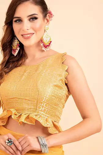 Yellow yellow poly chiffon embellished zari striped saree