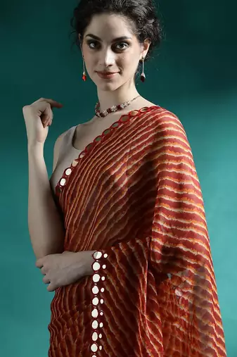 Red printed saree with blouse piece