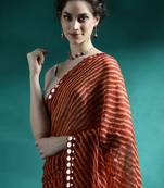 Red printed saree with blouse piece