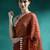 Red printed saree with blouse piece
