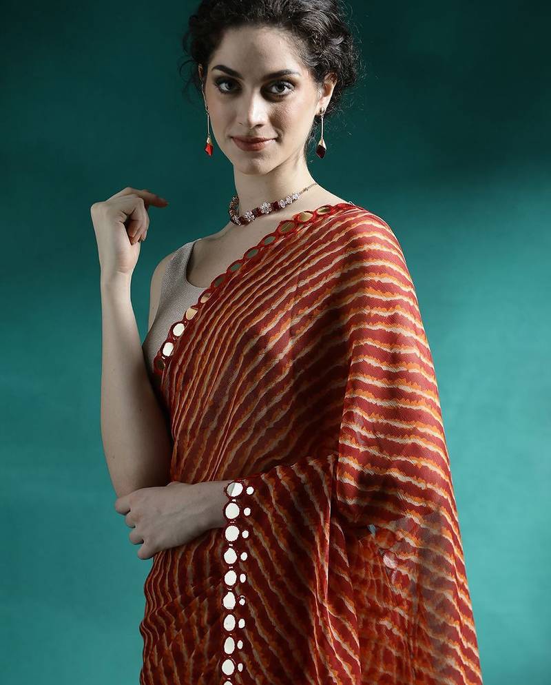 Red printed saree with blouse piece