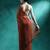 Red printed saree with blouse piece