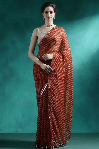 Red printed saree with blouse piece