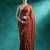 Red printed saree with blouse piece