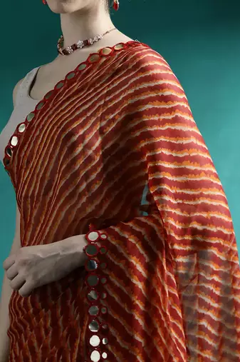 Red printed saree with blouse piece