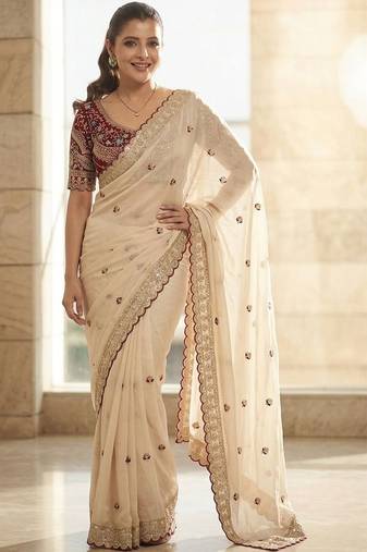 White embellished embroidered sequinned sarees with blouse piece