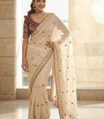 White embellished embroidered sequinned sarees with blouse piece