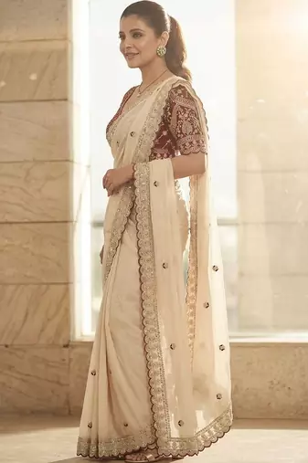 White embellished embroidered sequinned sarees with blouse piece