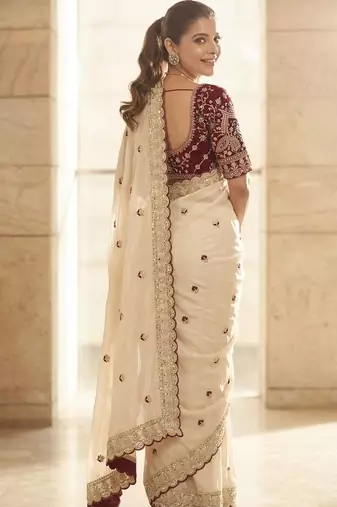 White embellished embroidered sequinned sarees with blouse piece